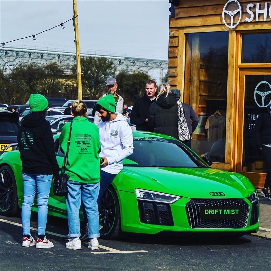 Drift Mist founder with friends and the R8